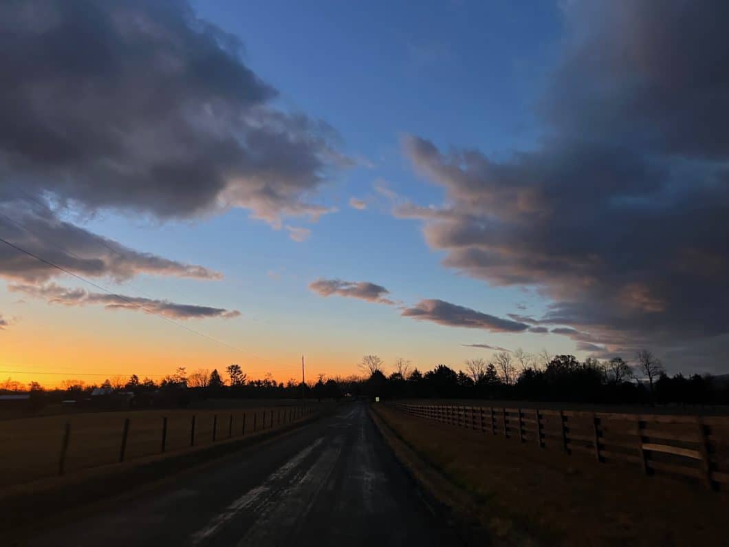 Sunrise along Browns Gap in Crozet, Virginia. Dark clouds, sun just over the horizon