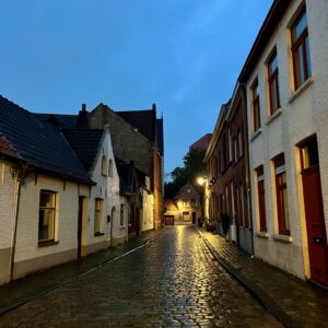 light at the end of a cobbled street