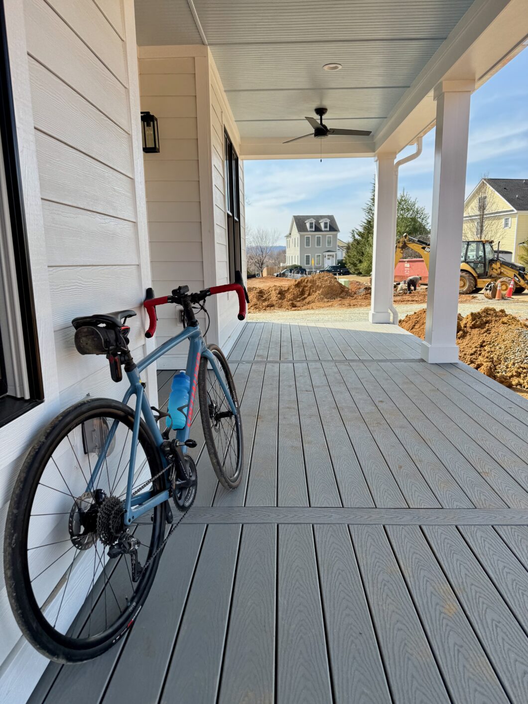 Bike on a porch of new construction home. Riding to clients is always good.